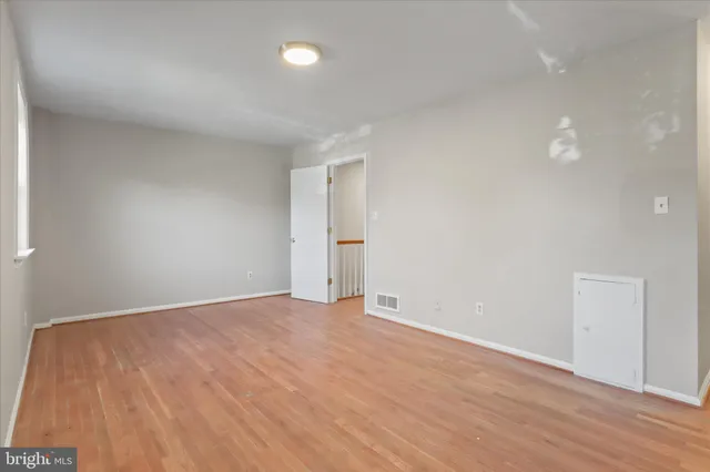 a bathroom with a sink toilet and a mirror
