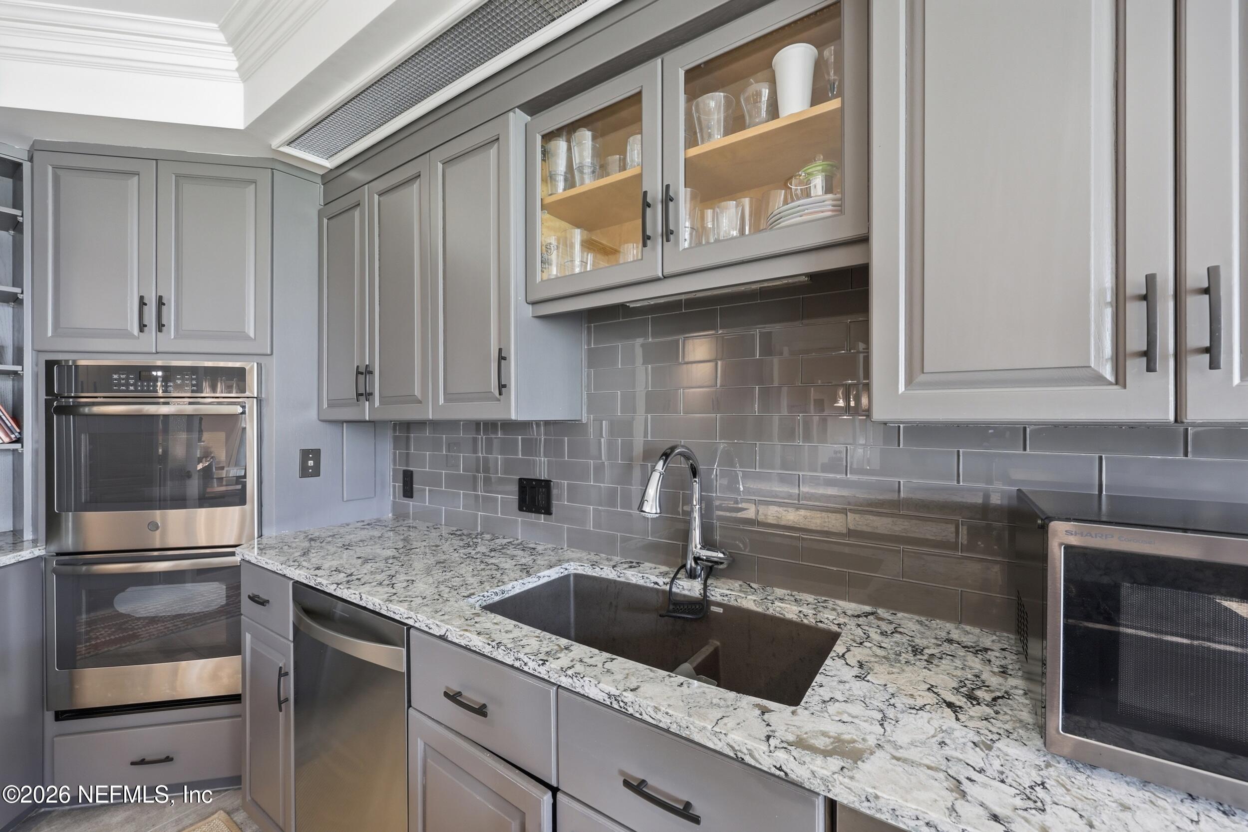 2656 Beauclerc Road Jacksonville, FL 32257 - Photo 17 of 81 Kitchen sink with backsplash