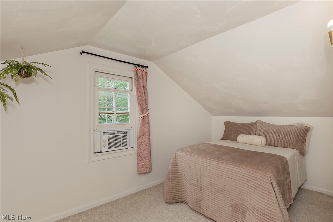 11292 Butternut Road Chardon, OH 44024 - Photo 35 of 49 Attic bedroom featuring pitched ceilings and neutral wall finishes