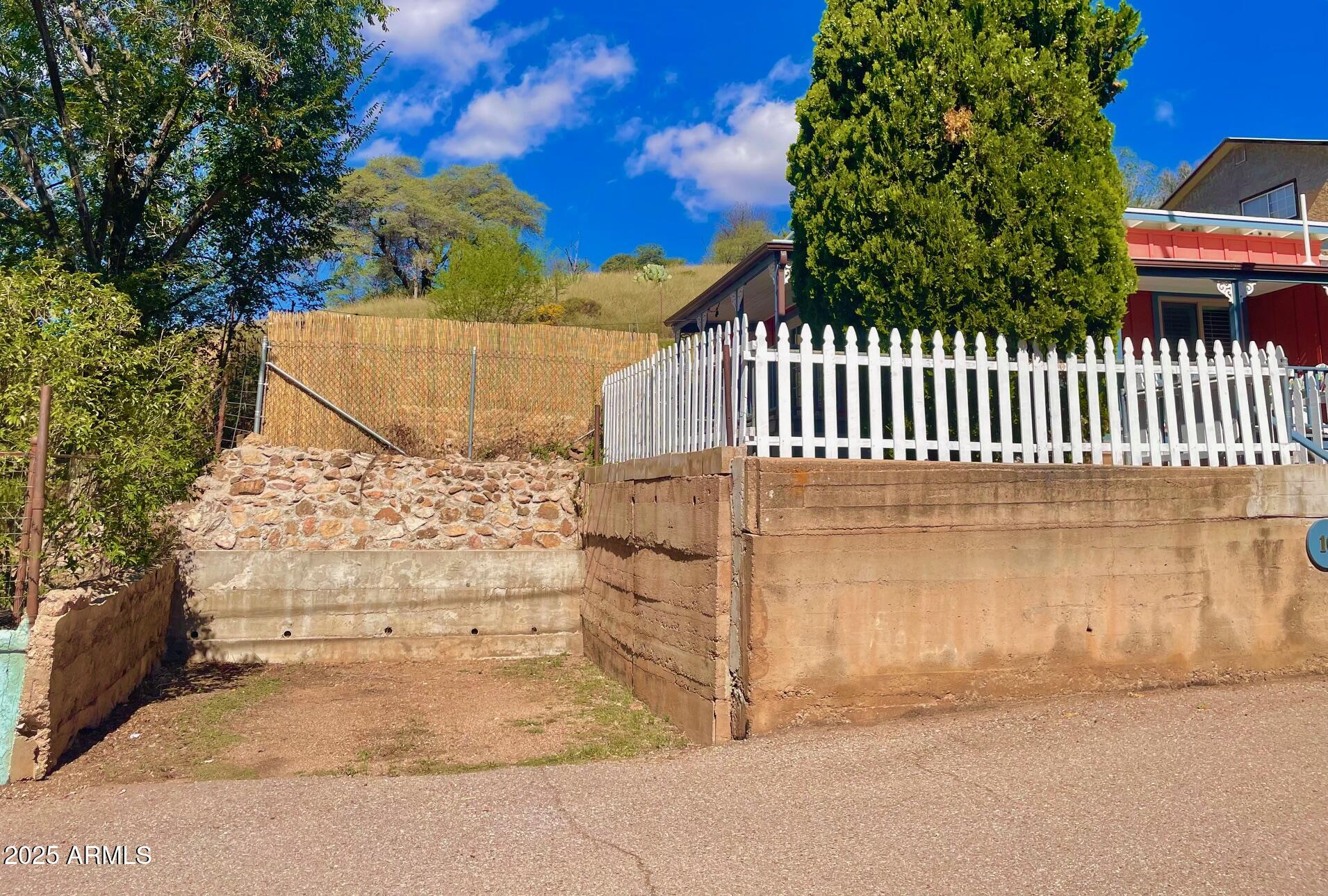 10 Locklin Avenue Bisbee, AZ 85603 - Photo 2 of 35 a view of a pathway of a house