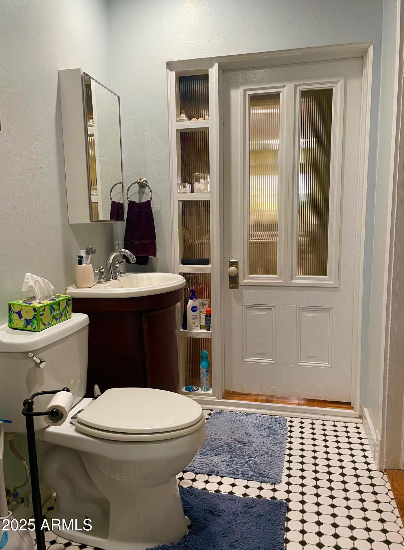 10 Locklin Avenue Bisbee, AZ 85603 - Photo 34 of 35 a bathroom with a sink a toilet and shower
