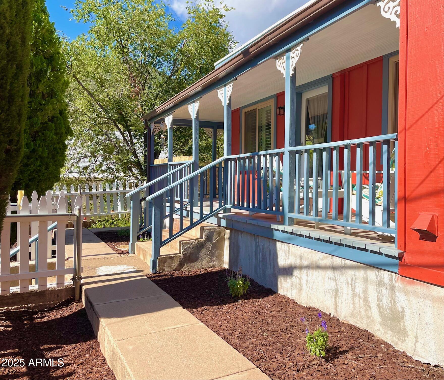 10 Locklin Avenue Bisbee, AZ 85603 - Photo 5 of 35 a view of a house with a wooden deck