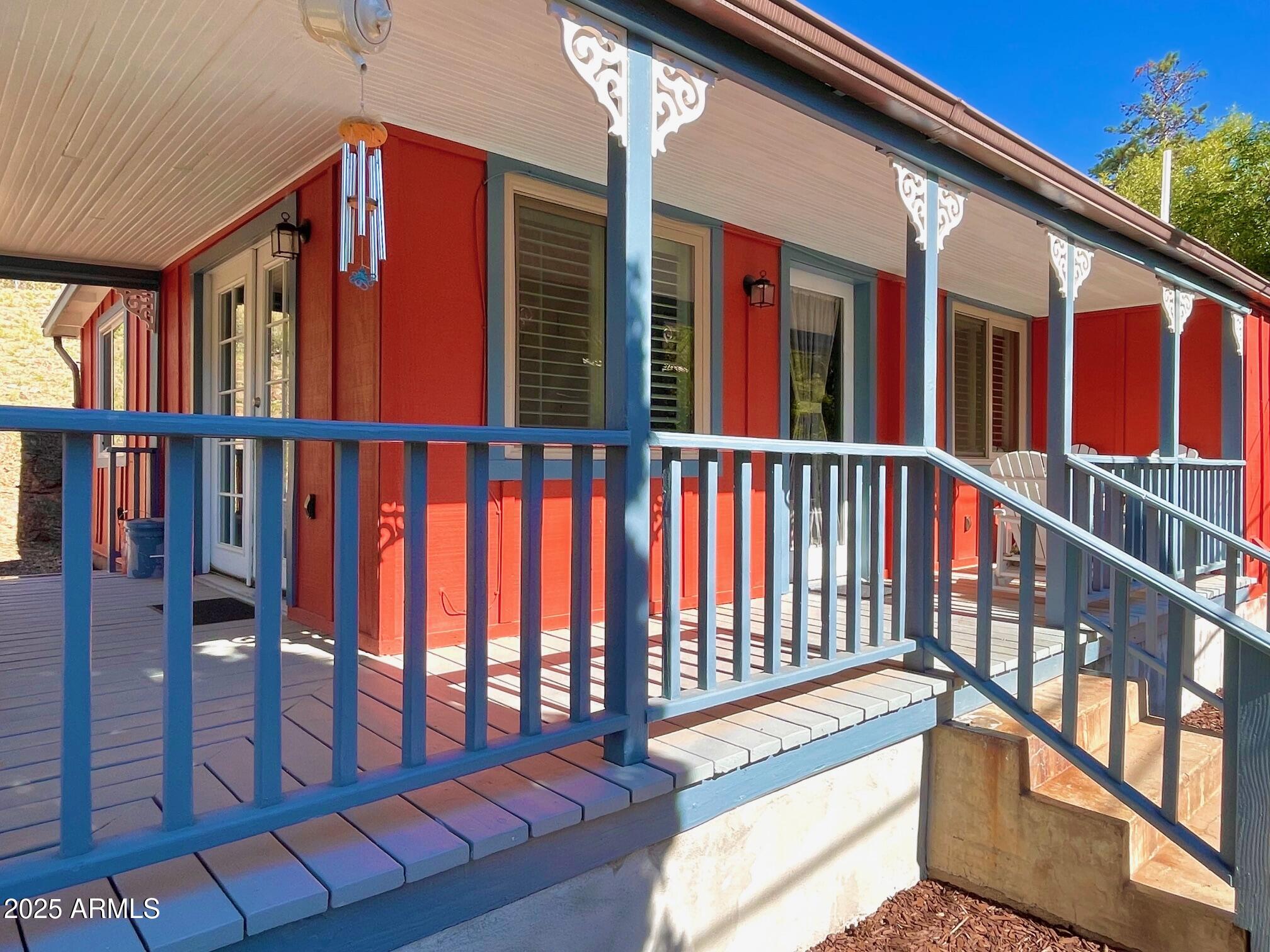 10 Locklin Avenue Bisbee, AZ 85603 - Photo 6 of 35 a view of a balcony with furniture