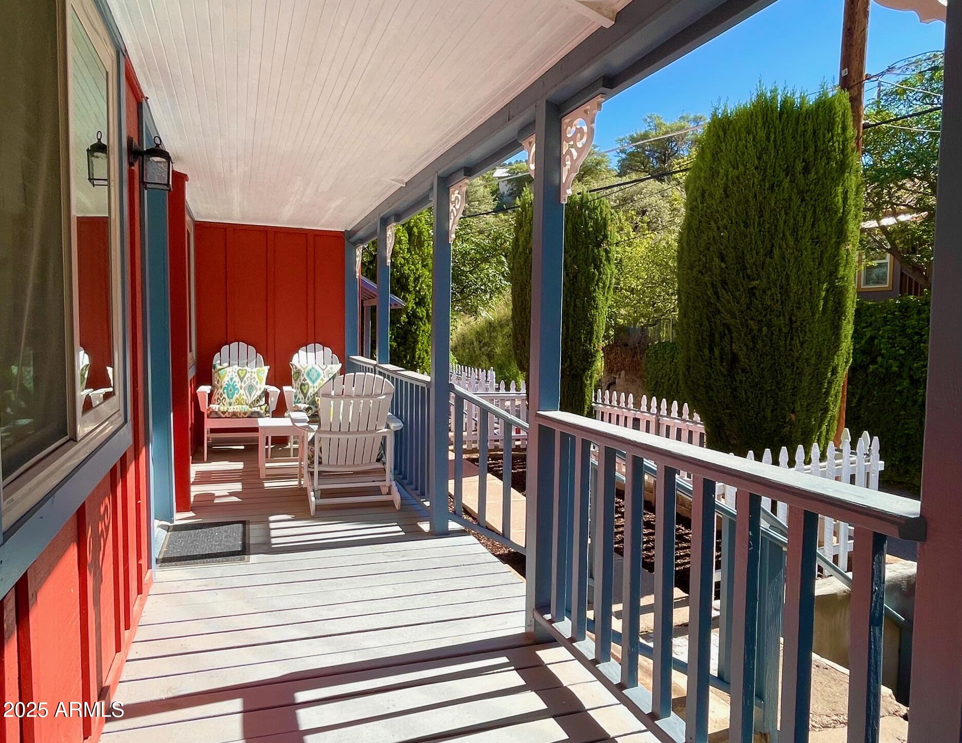 10 Locklin Avenue Bisbee, AZ 85603 - Photo 8 of 35 a view of a two chairs in the balcony
