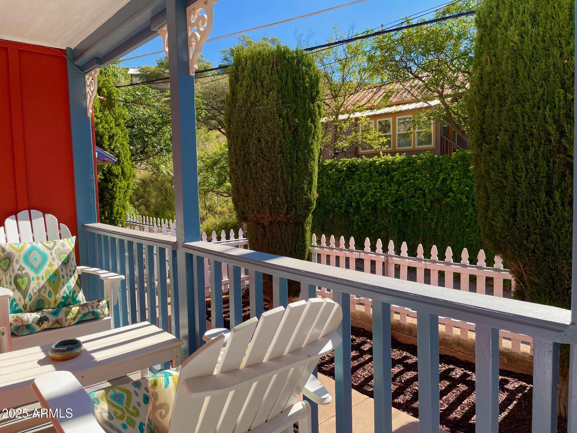 10 Locklin Avenue Bisbee, AZ 85603 - Photo 9 of 35 a view of a chairs and table in the balcony