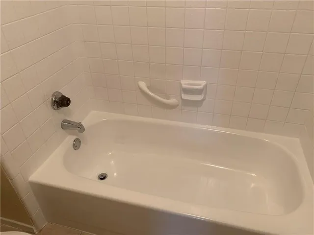 a close up of a bathtub