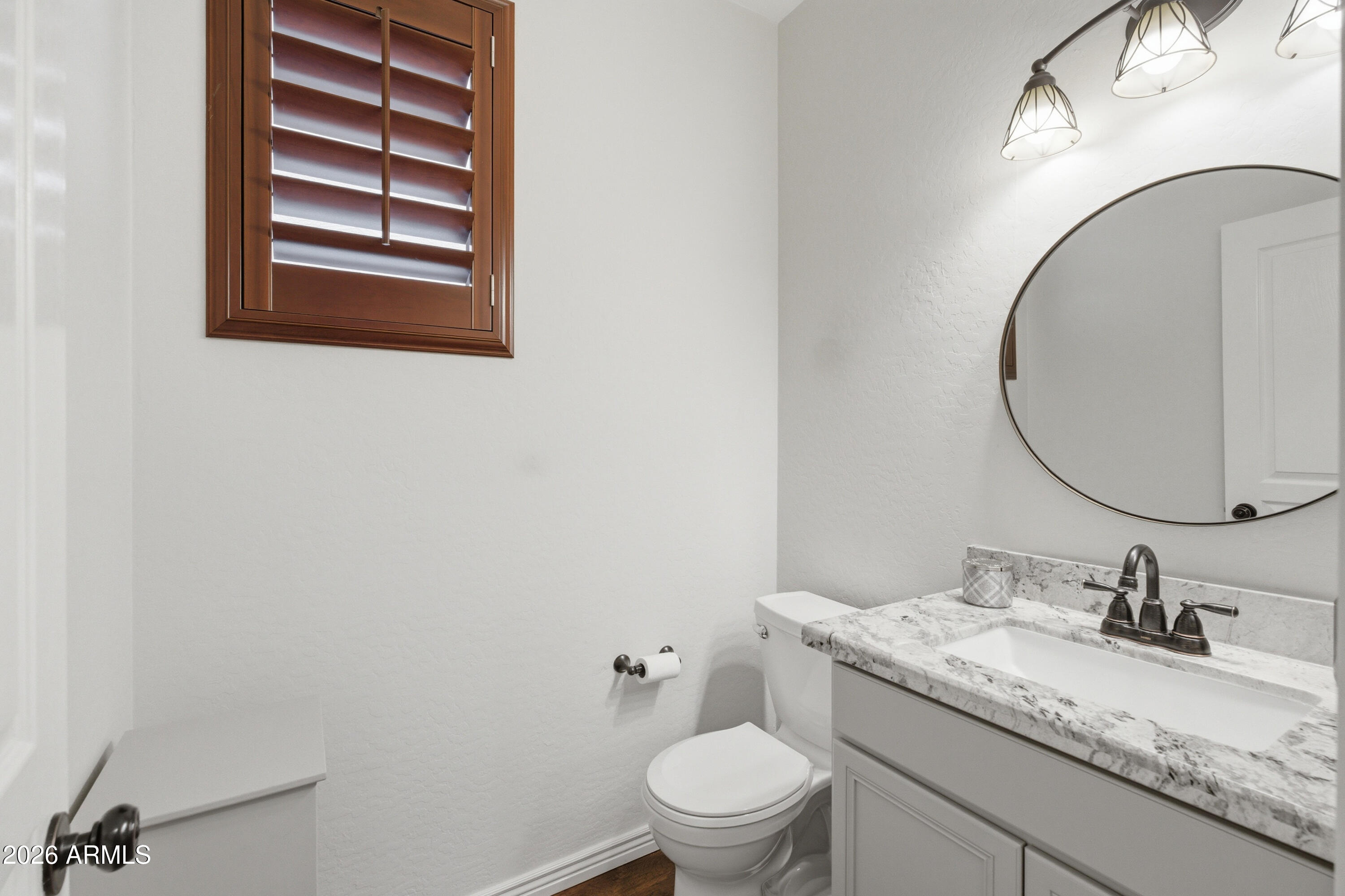 3927 South Rim Road Gilbert, AZ 85297 - Photo 22 of 45 2i downstairs bathroom