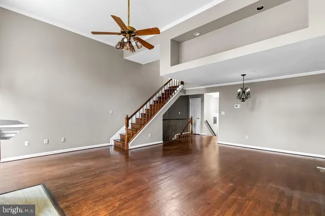 a view of an entryway with wooden floor