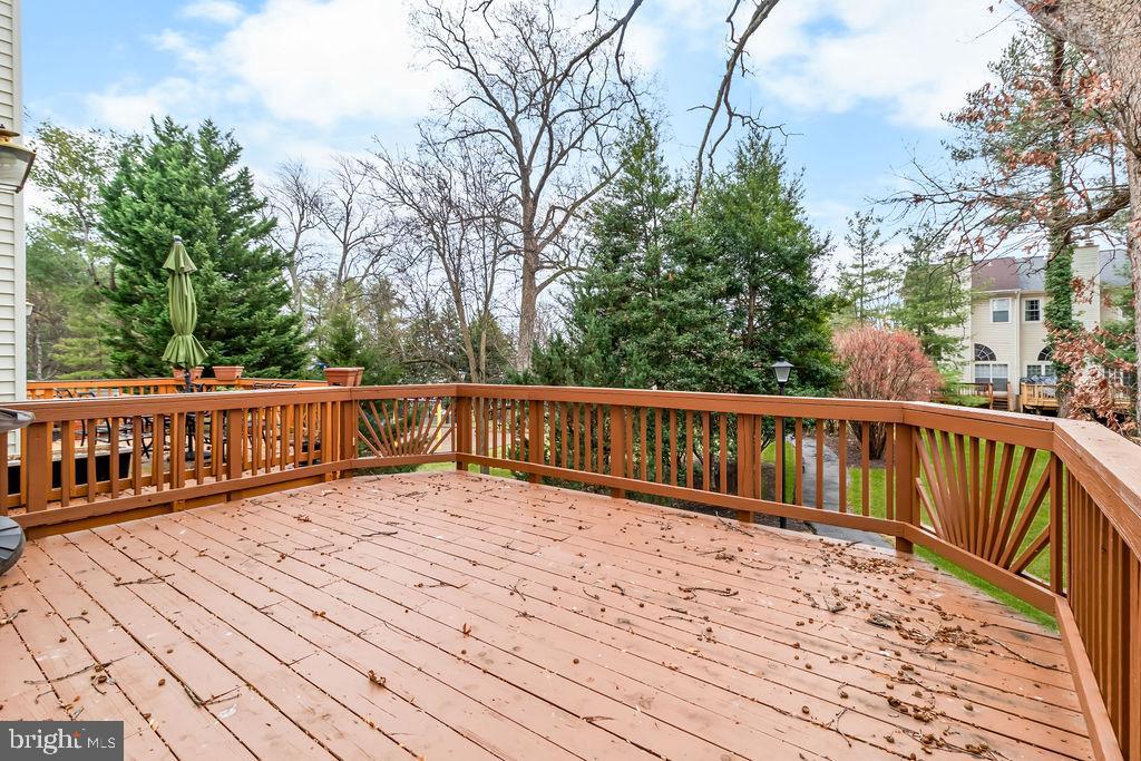 58 Silver Moon Drive Silver Spring, MD 20904 - Photo 15 of 34 a balcony with wooden floor and fence