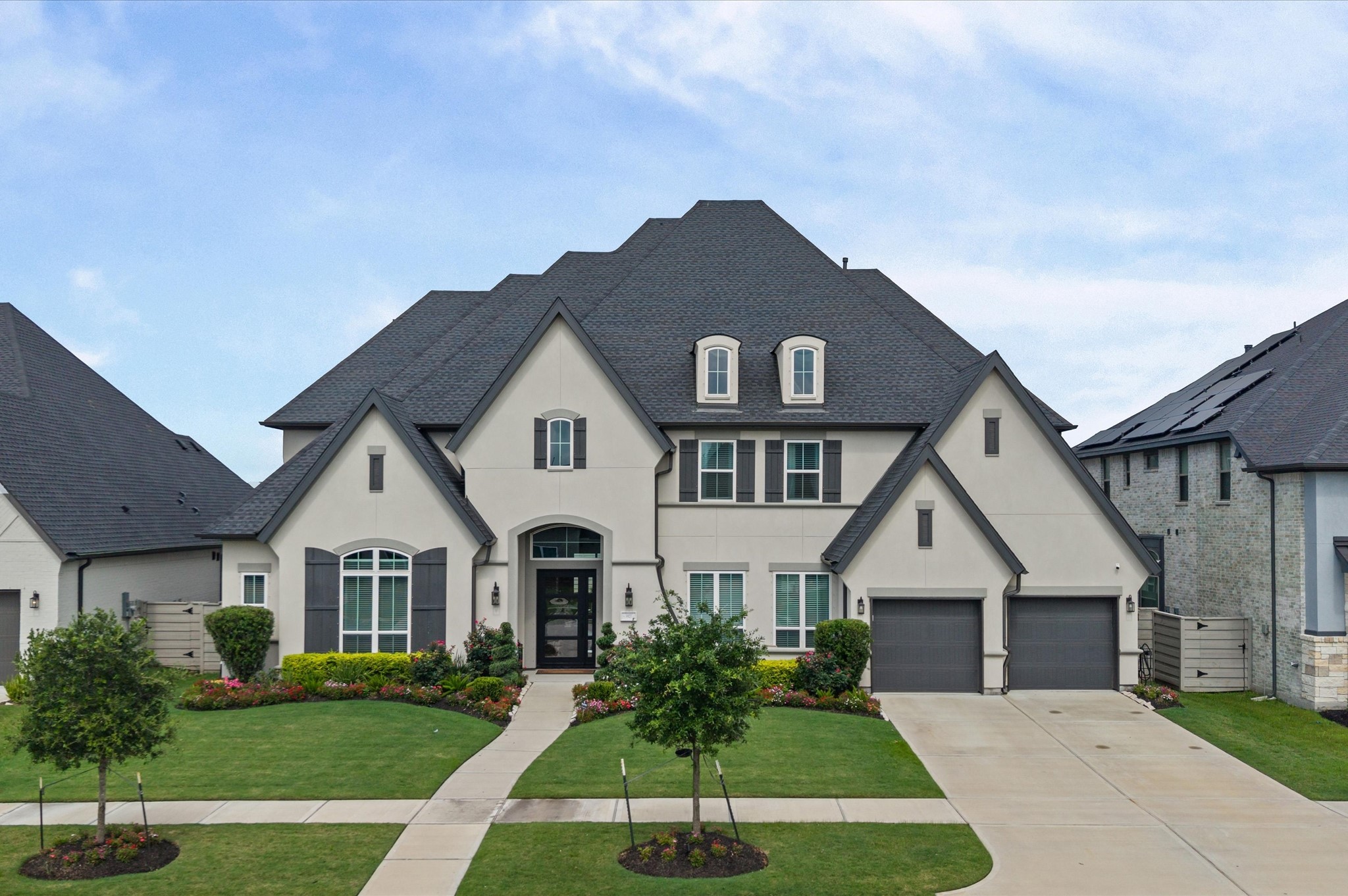 4923 Grapevine Lane Manvel, TX 77578 - Photo 1 of 49 a view of house with garden