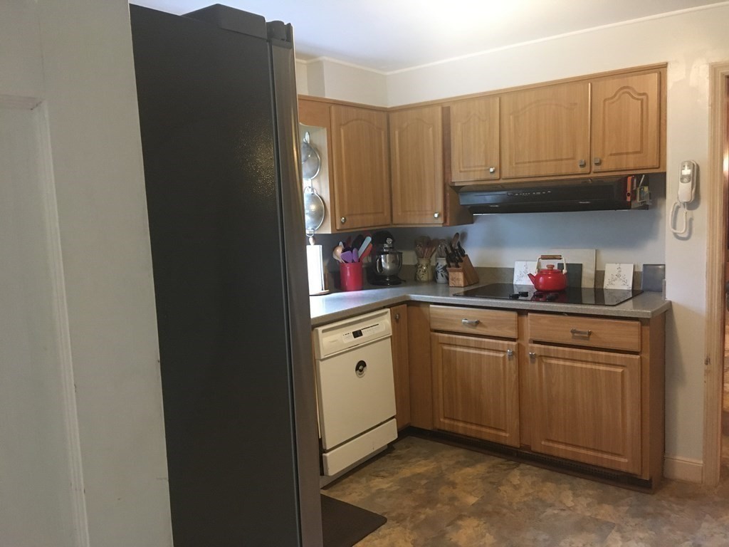 18 Butternut Drive Sutton, MA 01590 - Photo 11 of 34 a kitchen with stainless steel appliances granite countertop a refrigerator and sink