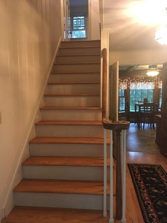 18 Butternut Drive Sutton, MA 01590 - Photo 22 of 34 a view of entryway and hall with wooden floor
