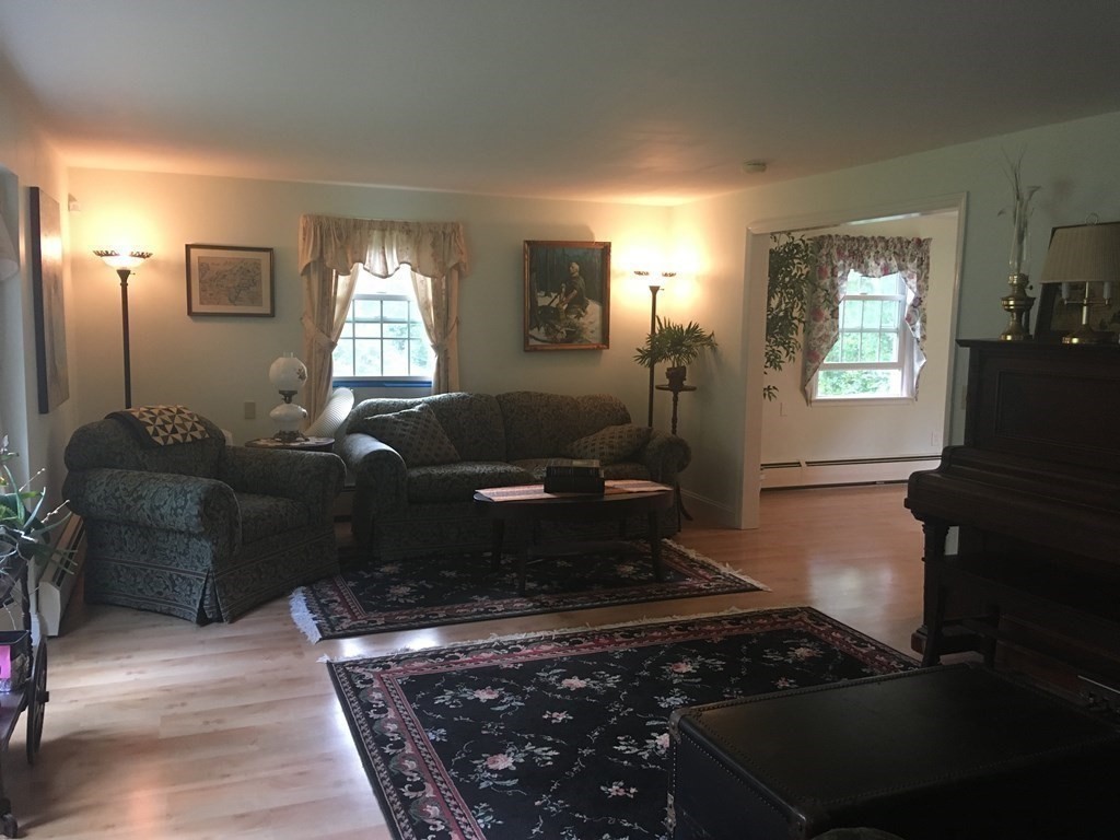 18 Butternut Drive Sutton, MA 01590 - Photo 5 of 34 a living room with furniture and a window