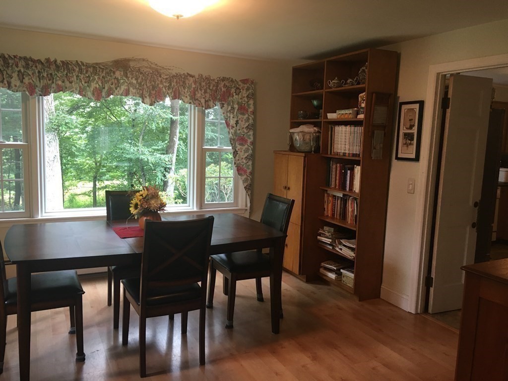 18 Butternut Drive Sutton, MA 01590 - Photo 8 of 34 a view of a dining room with furniture and a window