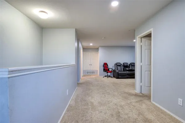 a view of a storage & utility room with two washing machine