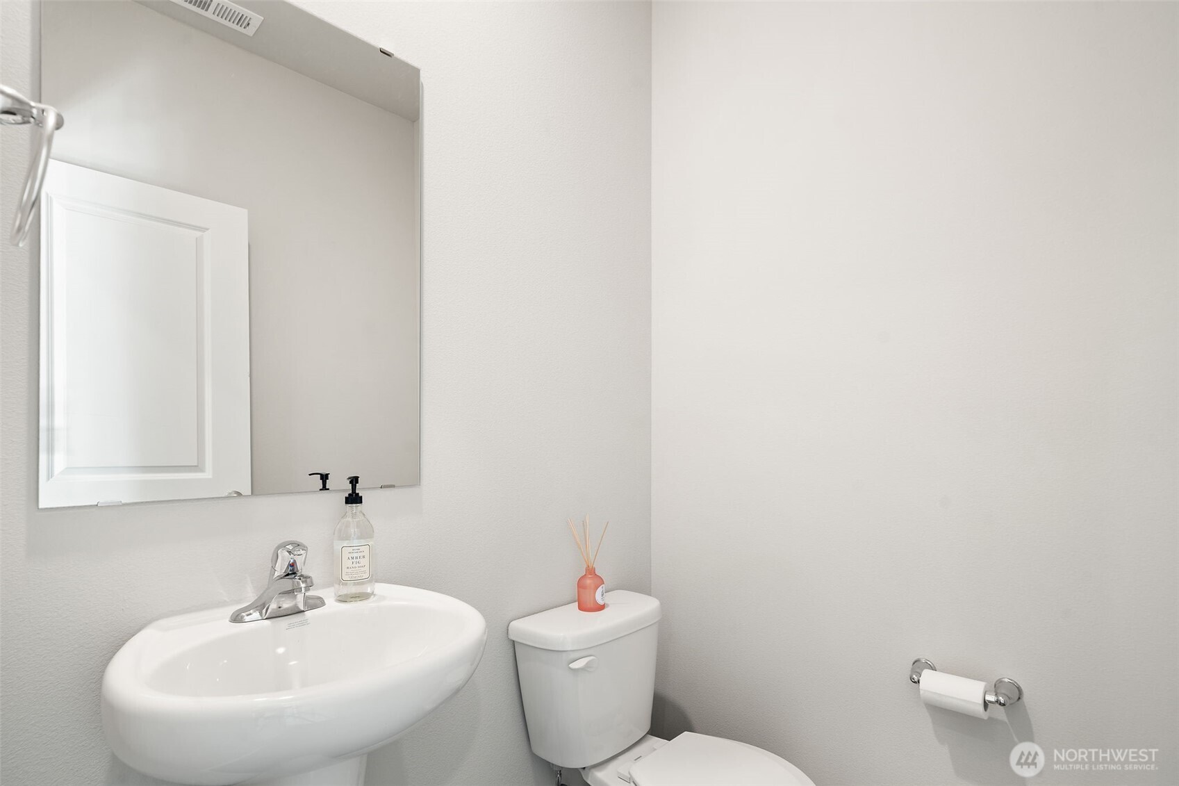 949 Tetherow Street Bremerton, WA 98310 - Photo 14 of 35 a bathroom with a sink mirror and a toilet