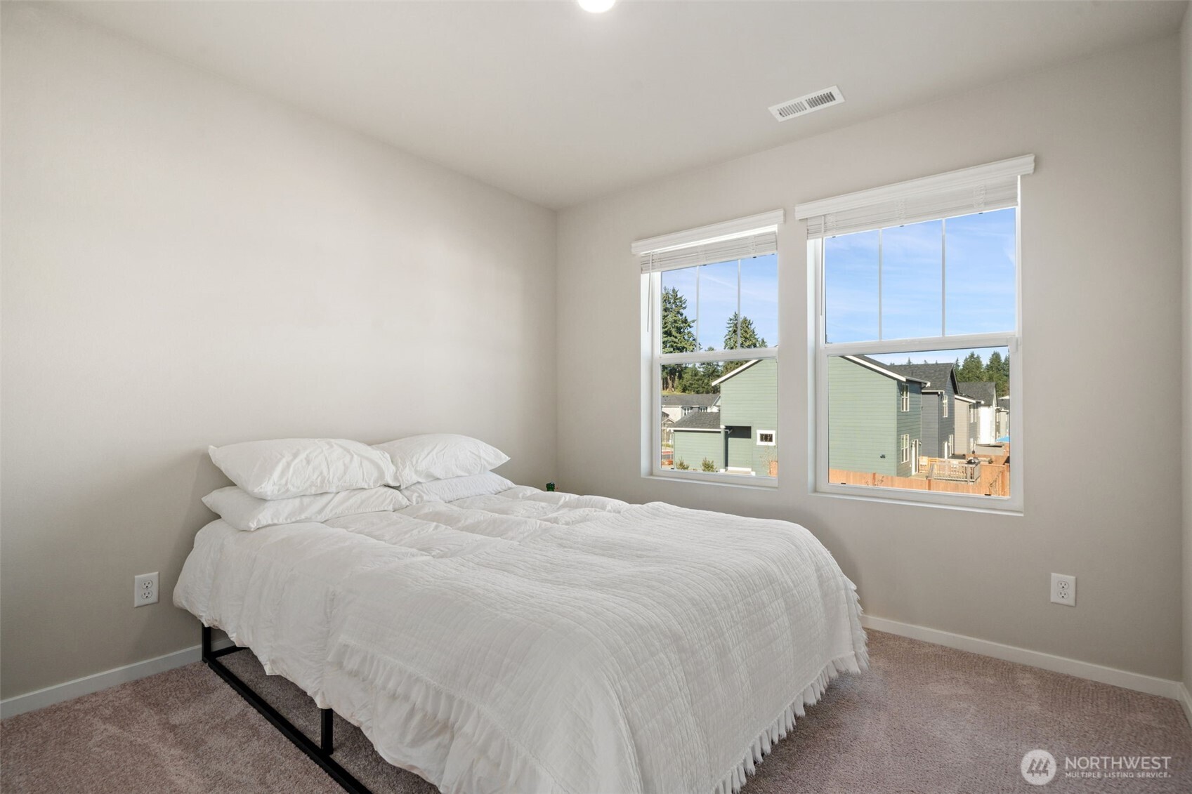 949 Tetherow Street Bremerton, WA 98310 - Photo 22 of 35 a bedroom with a bed and a window
