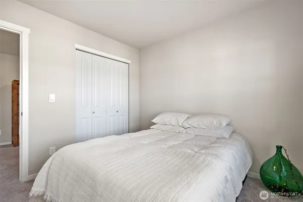 a room with furniture and a flat screen tv