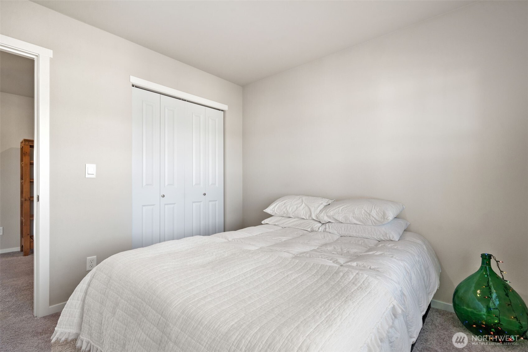 949 Tetherow Street Bremerton, WA 98310 - Photo 23 of 35 a bedroom with a bed and hallway