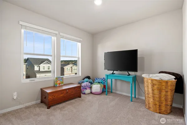 a room with furniture and a window