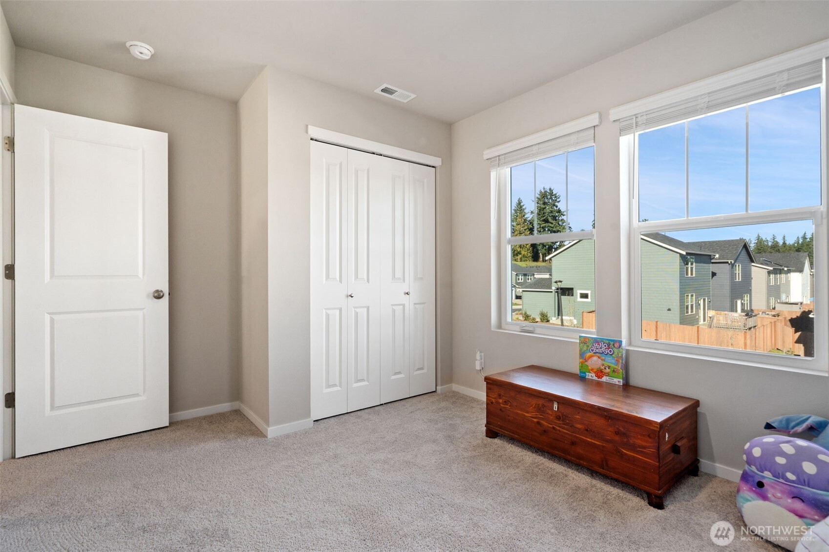 949 Tetherow Street Bremerton, WA 98310 - Photo 25 of 35 a room with furniture and a window