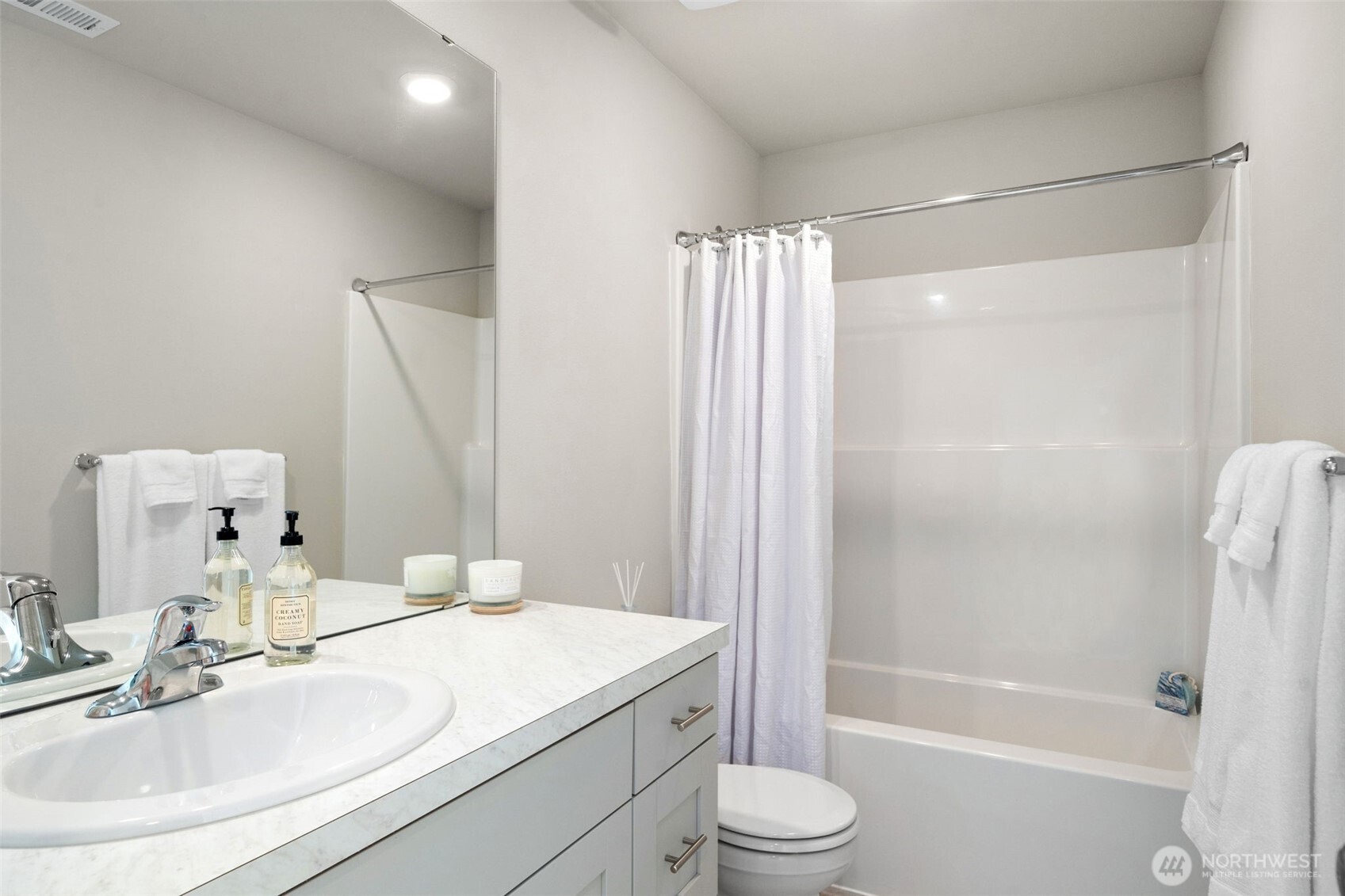 949 Tetherow Street Bremerton, WA 98310 - Photo 26 of 35 a bathroom with a granite countertop sink toilet and shower
