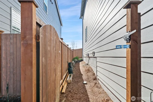 a view of a balcony with wooden walls and stairs