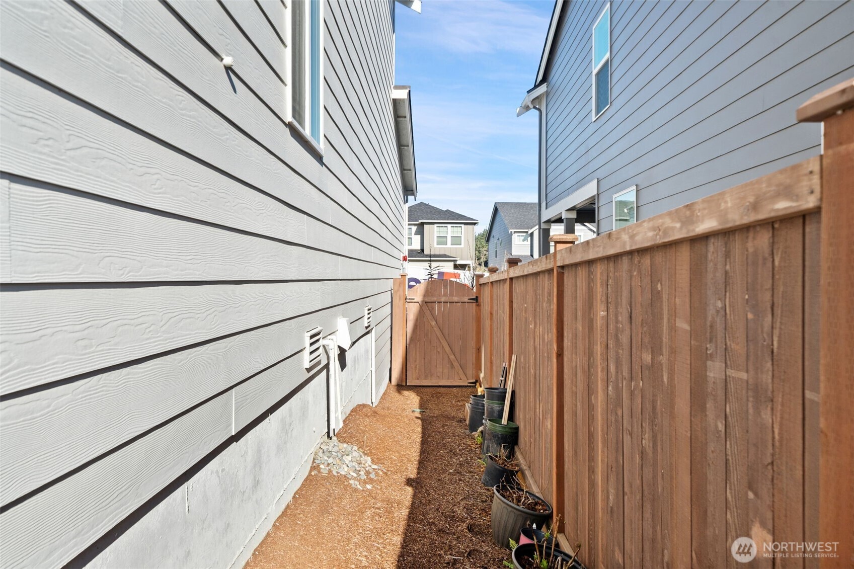 949 Tetherow Street Bremerton, WA 98310 - Photo 31 of 35 a view of a balcony with wooden walls and stairs