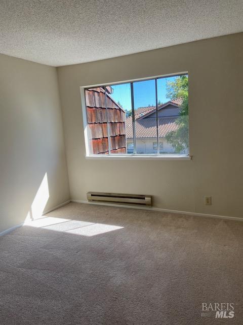 1565 Parkway Drive Rohnert Park, CA 94928 - Photo 22 of 25 an empty room with windows