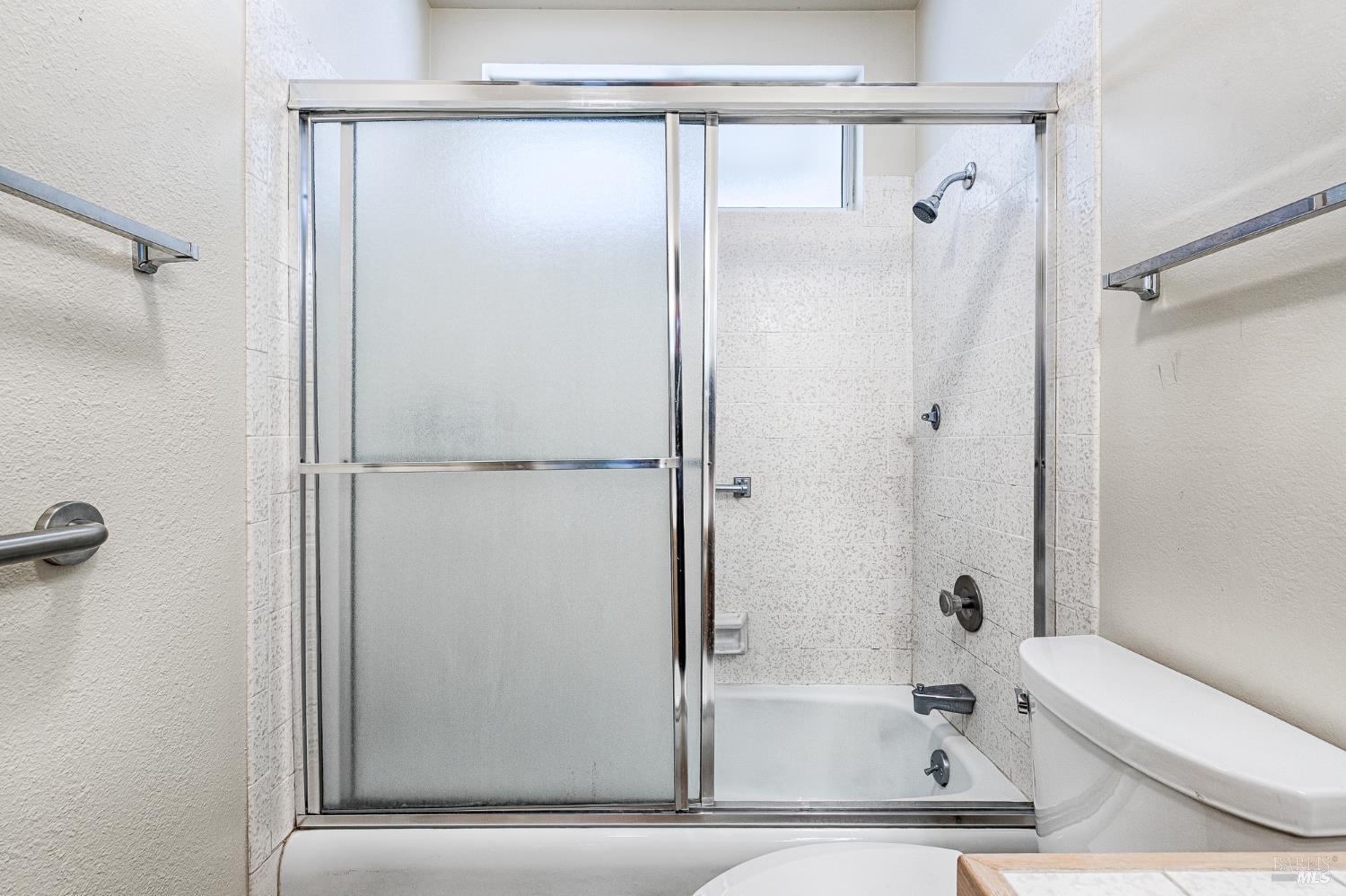 138 Oak Shadow Drive Santa Rosa, CA 95409 - Photo 32 of 50 a bathroom with a bathtub and a shower