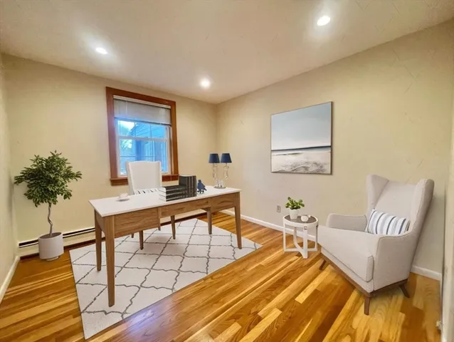 a room with furniture and a wooden floor
