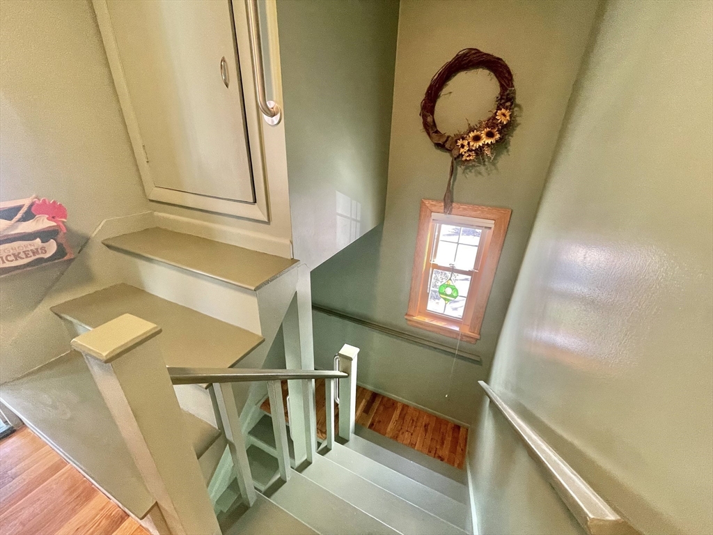77 Louise Road, Unit 77 Newton, MA 02467 - Photo 18 of 22 a view of entryway and kitchen