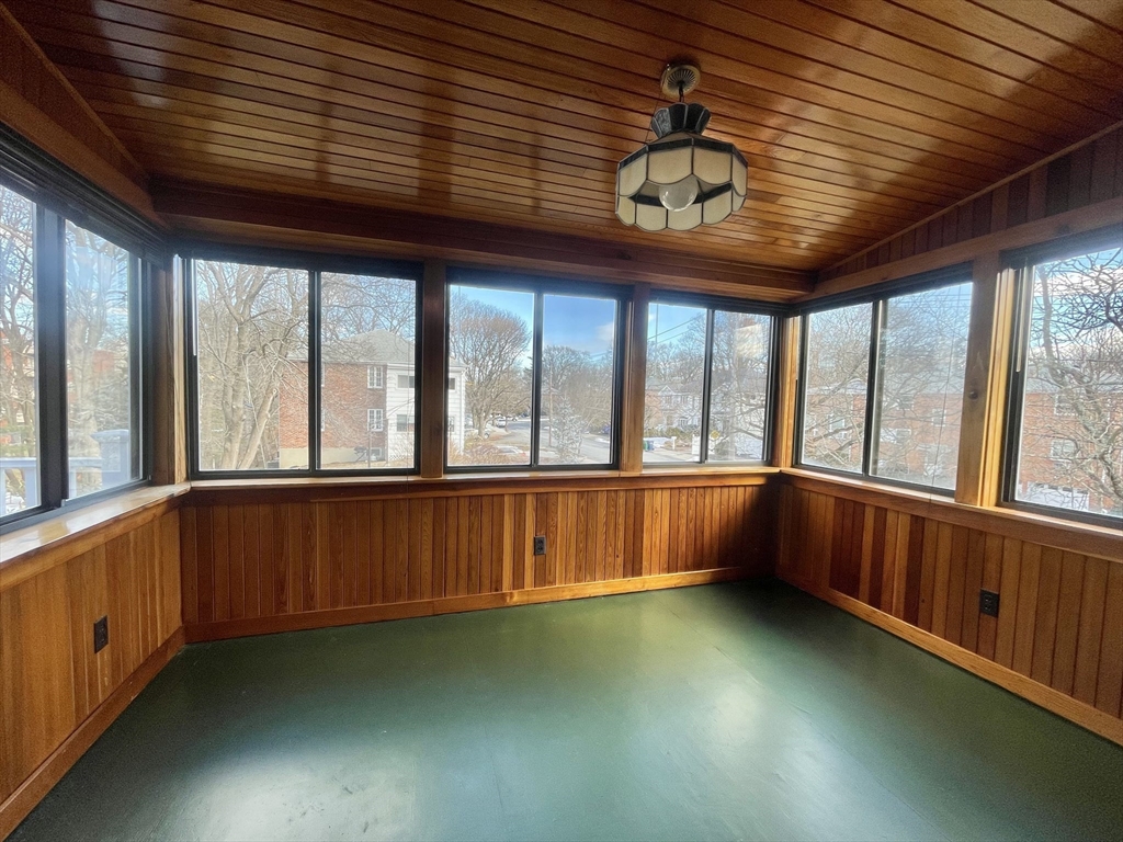 77 Louise Road, Unit 77 Newton, MA 02467 - Photo 19 of 22 a view of an empty room with a window