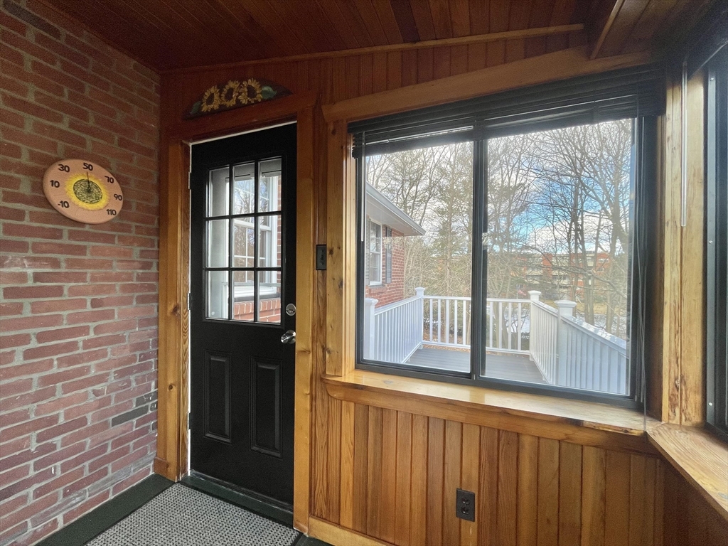 77 Louise Road, Unit 77 Newton, MA 02467 - Photo 20 of 22 a view of a door and a window