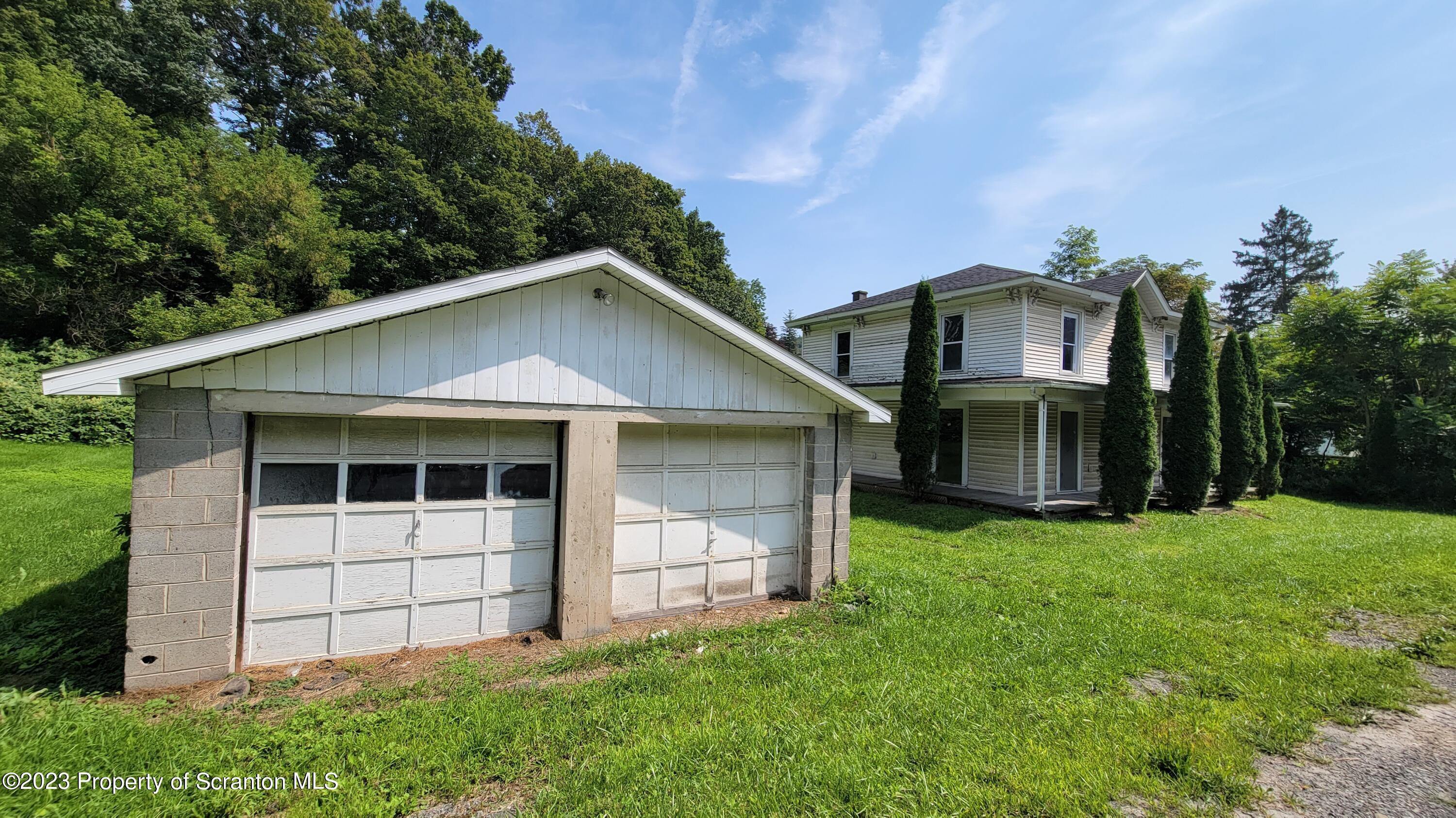 112 Mowry Road Meshoppen, PA 18630 - Photo 4 of 24 a view of a house with a yard