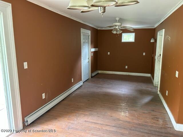 112 Mowry Road Meshoppen, PA 18630 - Photo 7 of 24 wooden floor in an empty room with a window