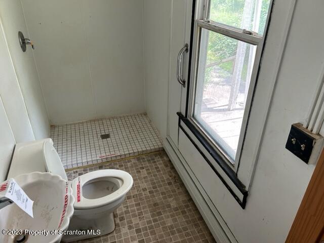 112 Mowry Road Meshoppen, PA 18630 - Photo 10 of 24 a bathroom with a toilet and a window