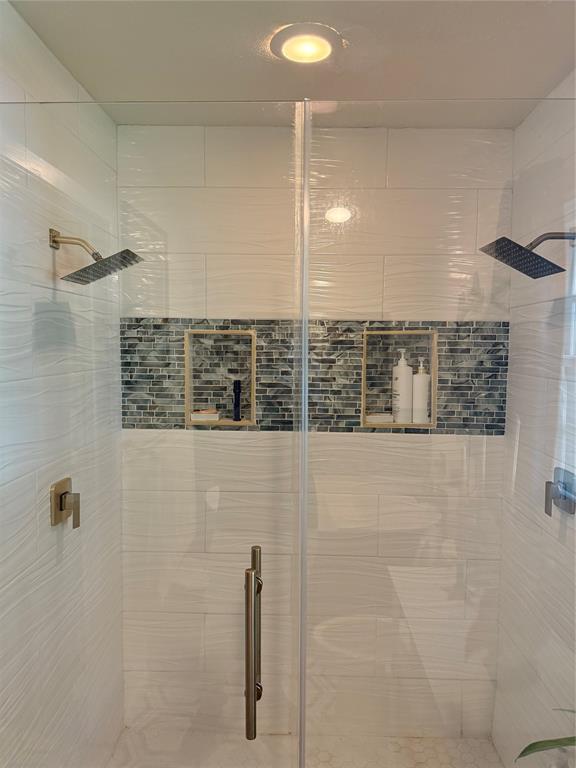 1650 Azteca Drive Fort Worth, TX 76112 - Photo 12 of 37 a bathroom with a shower