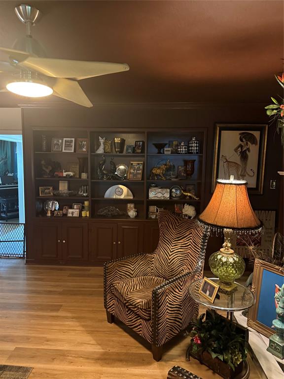 1650 Azteca Drive Fort Worth, TX 76112 - Photo 13 of 37 a living room with furniture and a lamp