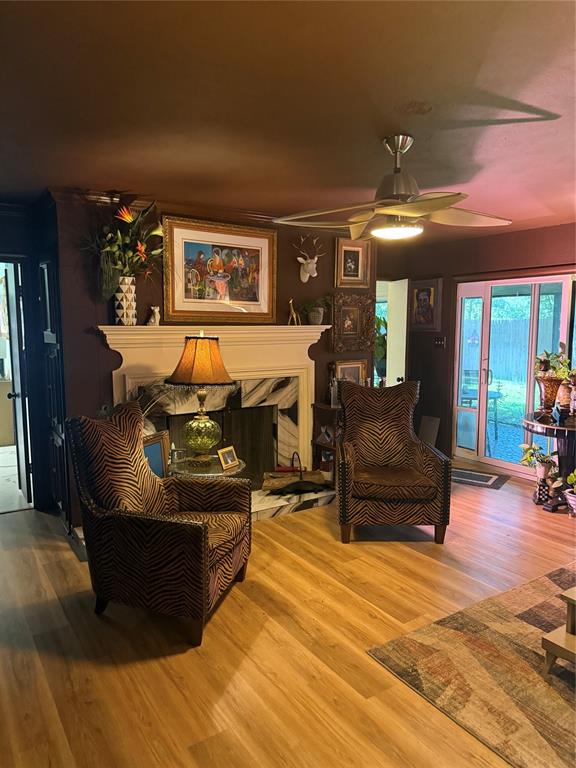 1650 Azteca Drive Fort Worth, TX 76112 - Photo 15 of 37 a living room with furniture and a wooden floor