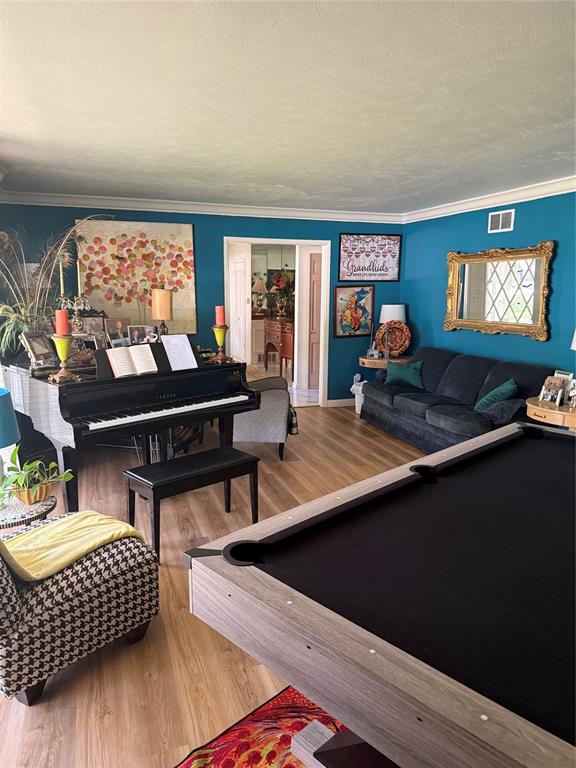 1650 Azteca Drive Fort Worth, TX 76112 - Photo 2 of 37 a living room with furniture window and wooden floor