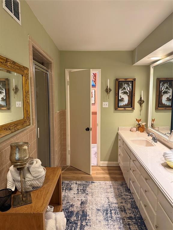 1650 Azteca Drive Fort Worth, TX 76112 - Photo 30 of 37 a spacious bathroom with a tub sink and mirror