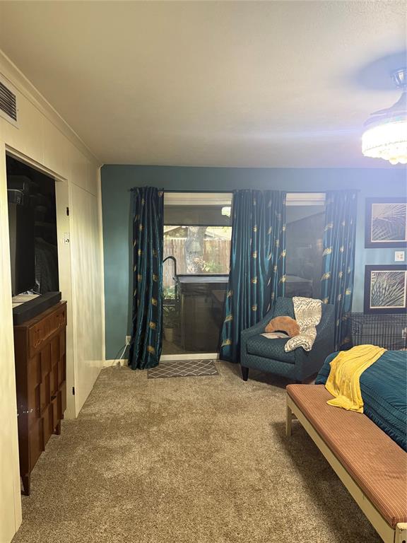 1650 Azteca Drive Fort Worth, TX 76112 - Photo 9 of 37 a living room with furniture and a flat screen tv