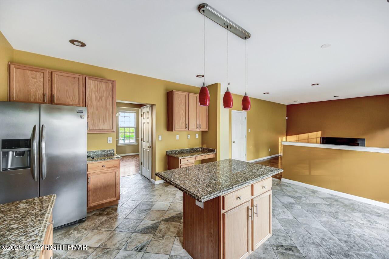 115 Daffodil Drive East Stroudsburg, PA 18301 - Photo 14 of 59 a kitchen with stainless steel appliances granite countertop a sink a oven and a refrigerator