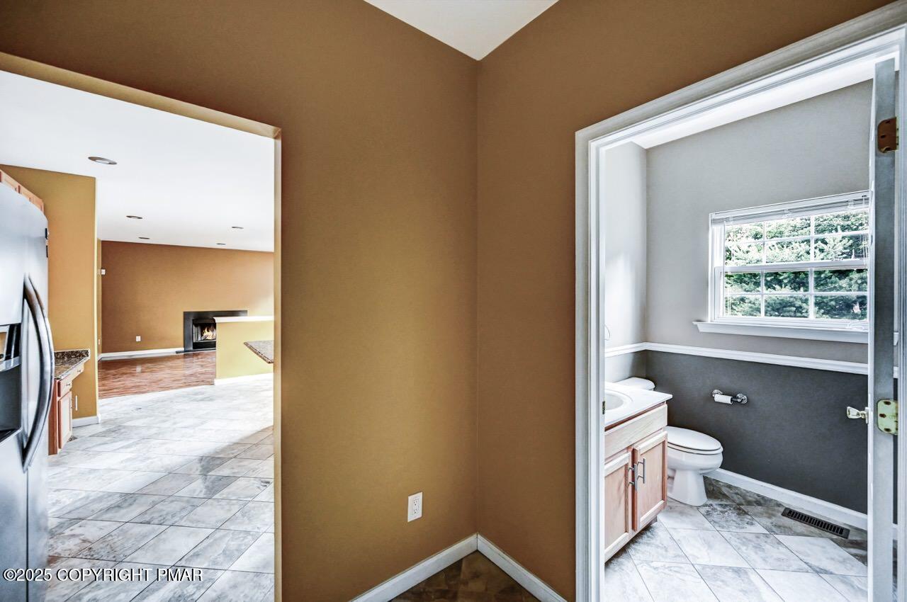 115 Daffodil Drive East Stroudsburg, PA 18301 - Photo 23 of 59 a bathroom with a toilet sink and a bathtub