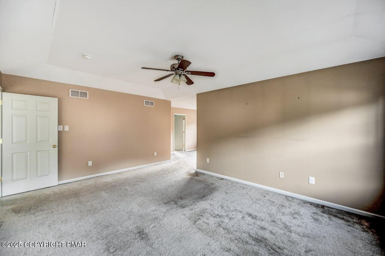 115 Daffodil Drive East Stroudsburg, PA 18301 - Photo 28 of 59 a view of an empty room with a ceiling fan