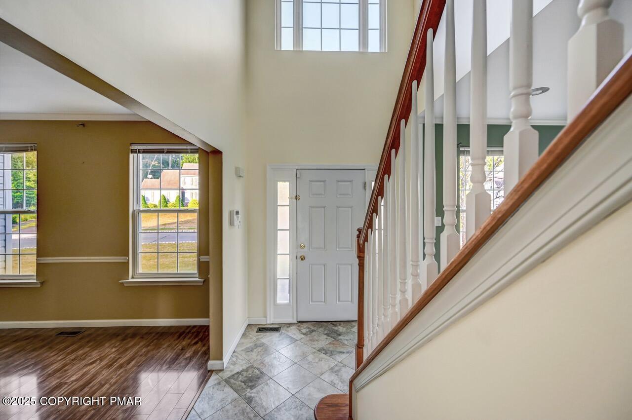 115 Daffodil Drive East Stroudsburg, PA 18301 - Photo 3 of 59 a view of an entryway with staircase