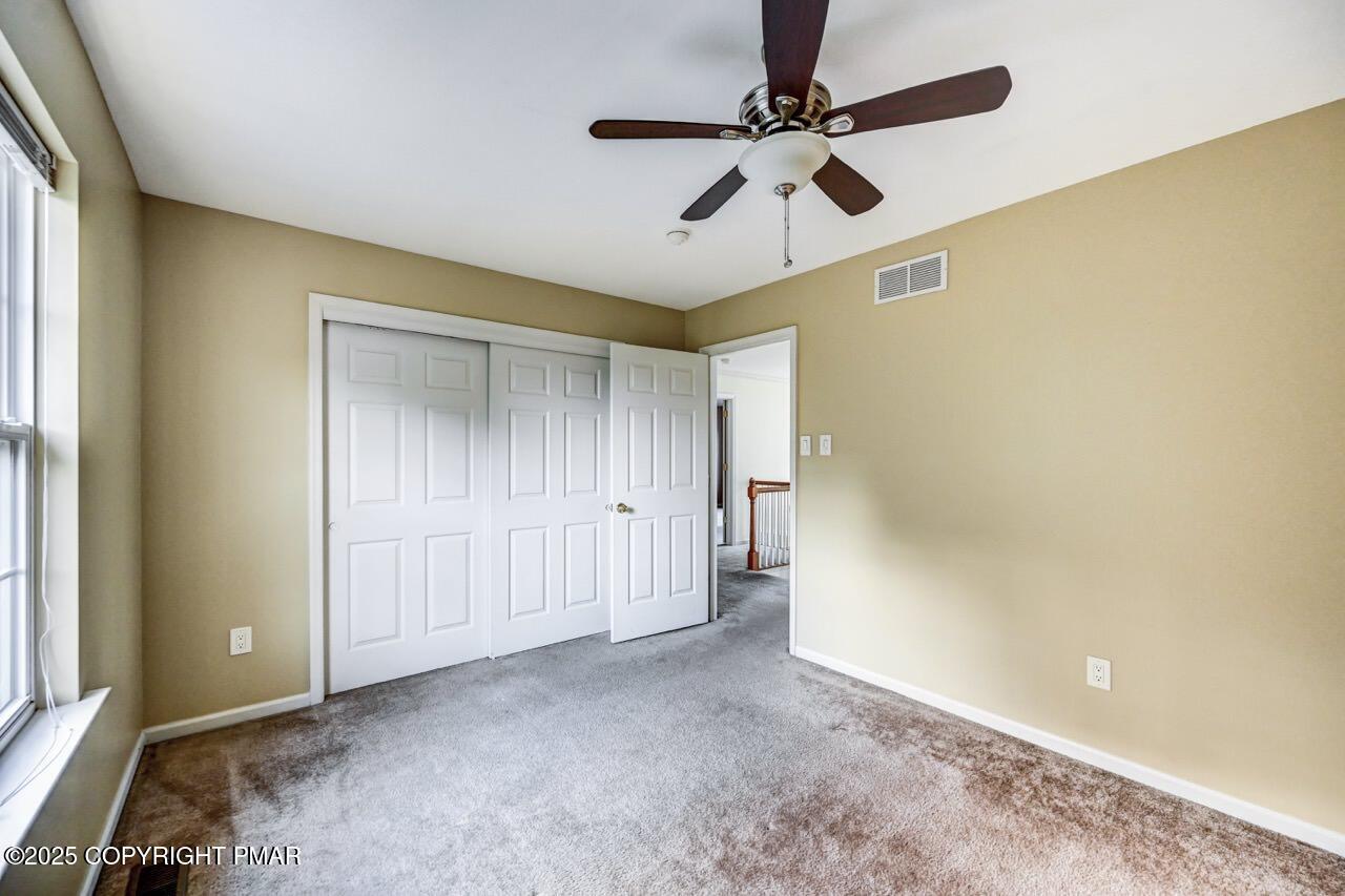 115 Daffodil Drive East Stroudsburg, PA 18301 - Photo 39 of 59 a view of room with a ceiling fan