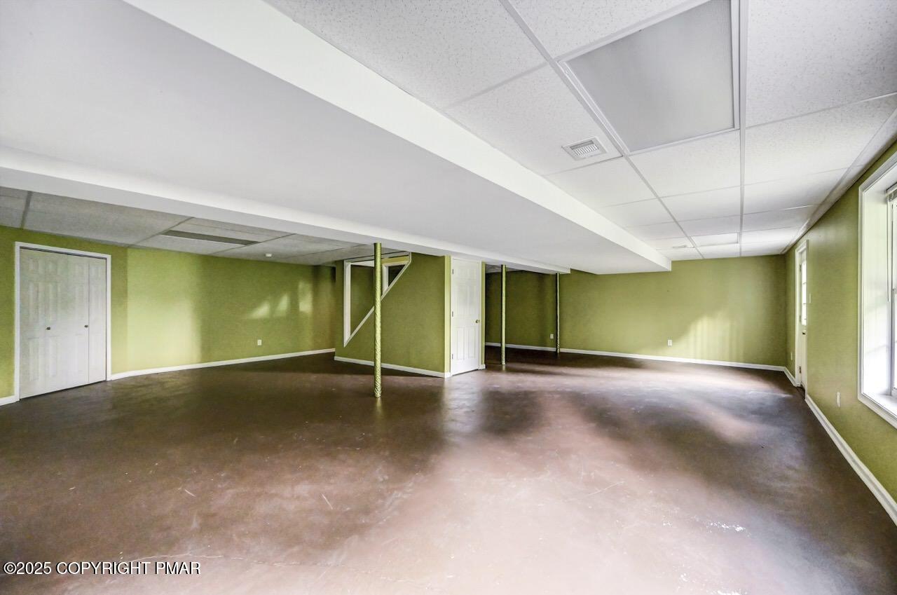 115 Daffodil Drive East Stroudsburg, PA 18301 - Photo 45 of 59 a view of empty room with a window and a basket ball court
