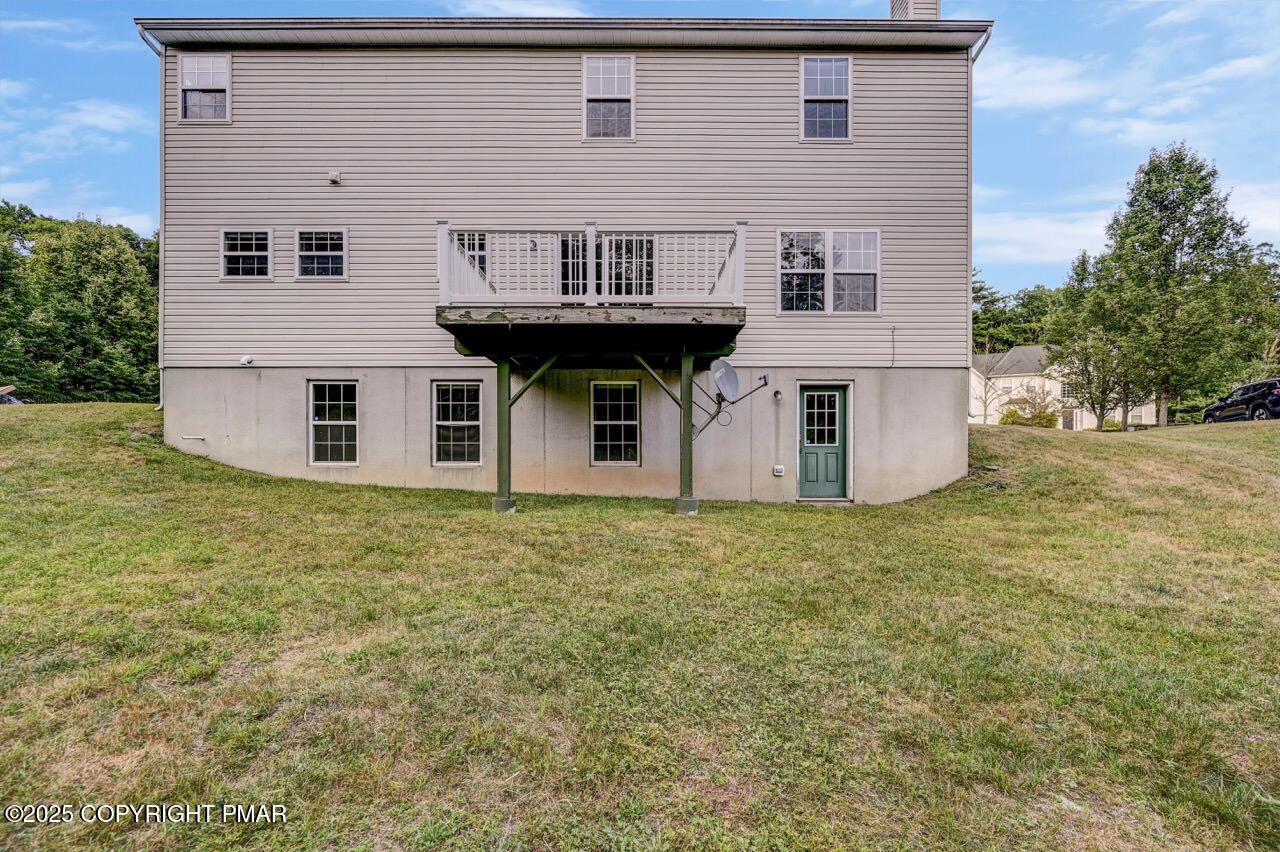 115 Daffodil Drive East Stroudsburg, PA 18301 - Photo 55 of 59 a view of a house with backyard